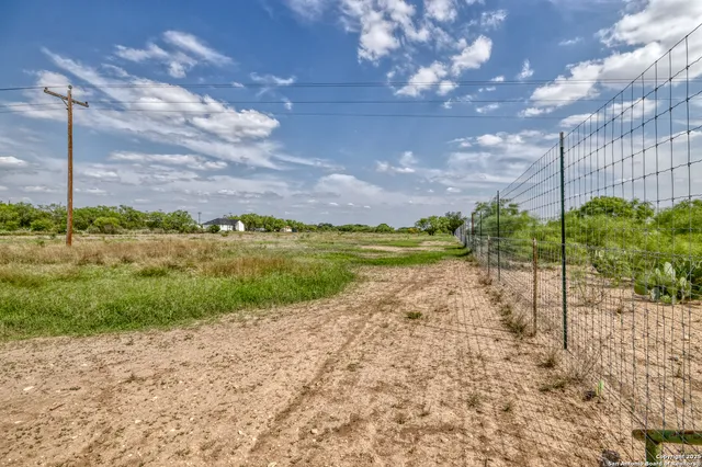 a view of a lake with a big yard