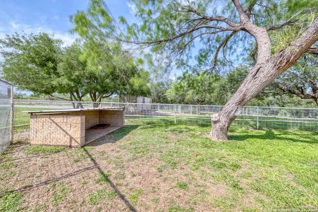 a view of a backyard with a garden