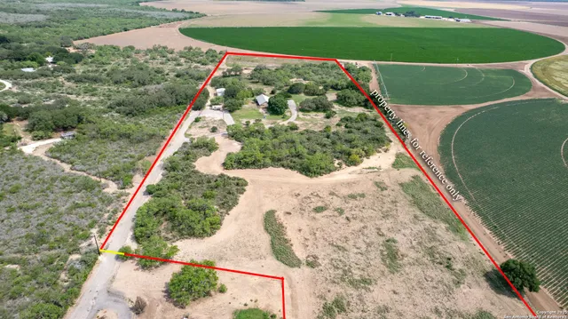 a view of a back yard of a house