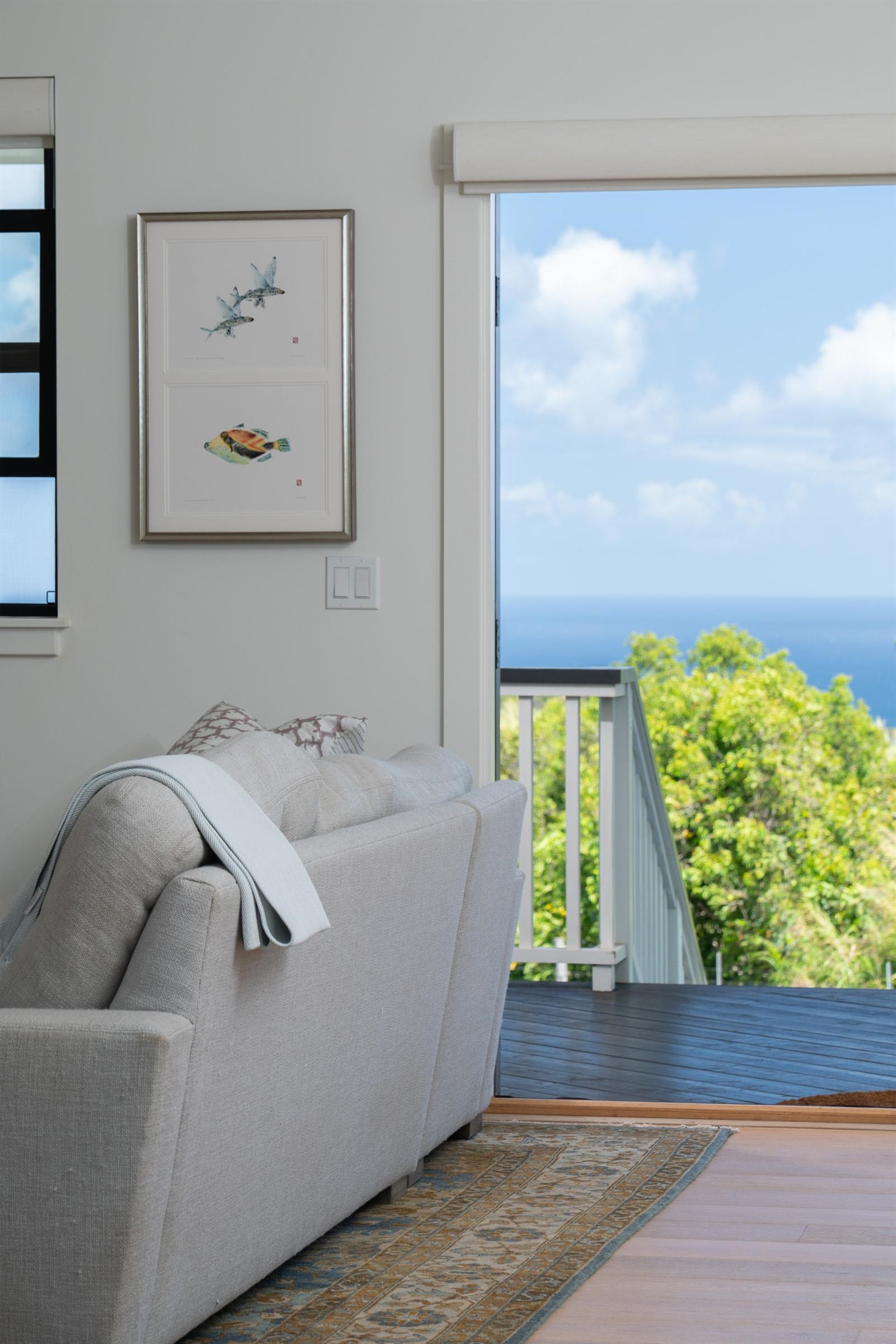 125 Hekuawa Street, Unit B Haiku, HI 96708 - Photo 17 of 50 a living room with a couch and a large window