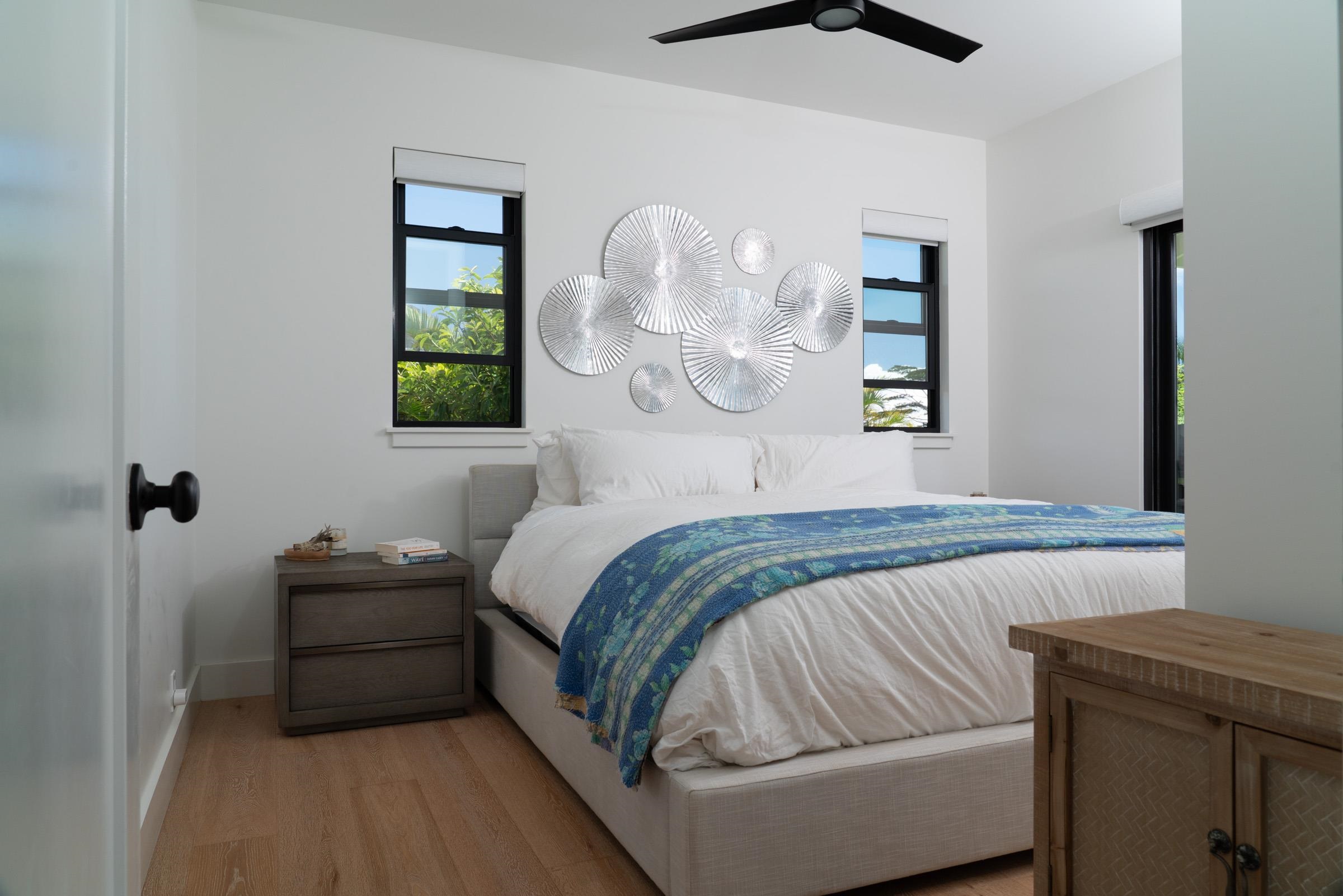 125 Hekuawa Street, Unit B Haiku, HI 96708 - Photo 23 of 50 a bedroom with a bed and a window