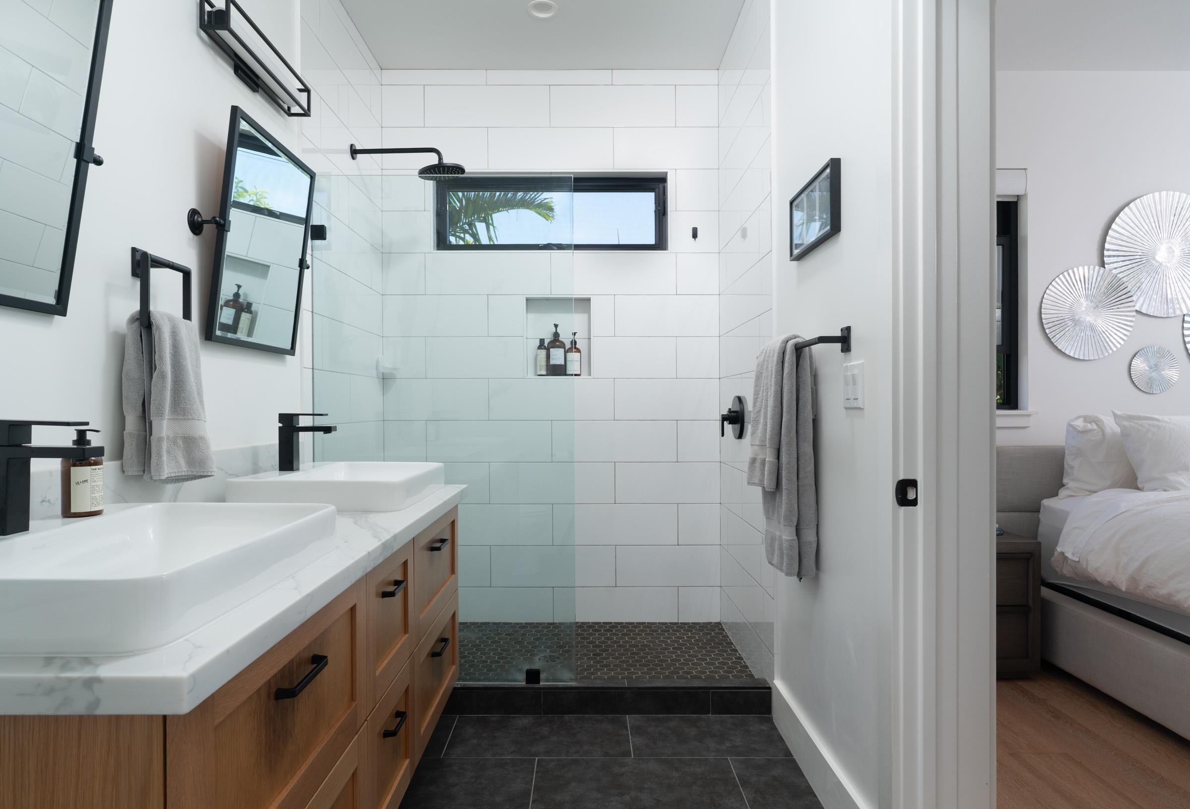 125 Hekuawa Street, Unit B Haiku, HI 96708 - Photo 26 of 50 a bathroom with sink shower and mirror
