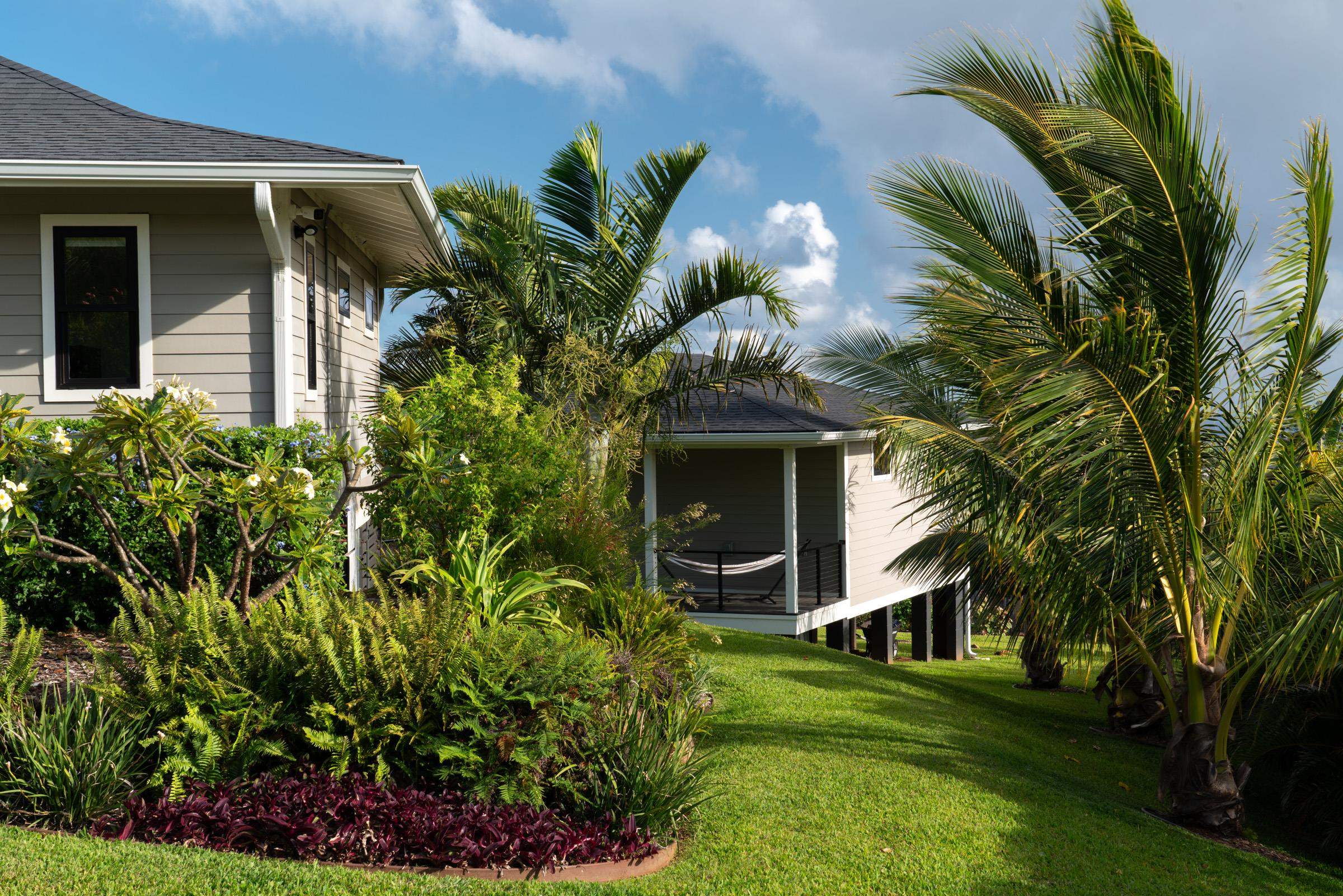 125 Hekuawa Street, Unit B Haiku, HI 96708 - Photo 45 of 50 a front view of a house with a yard