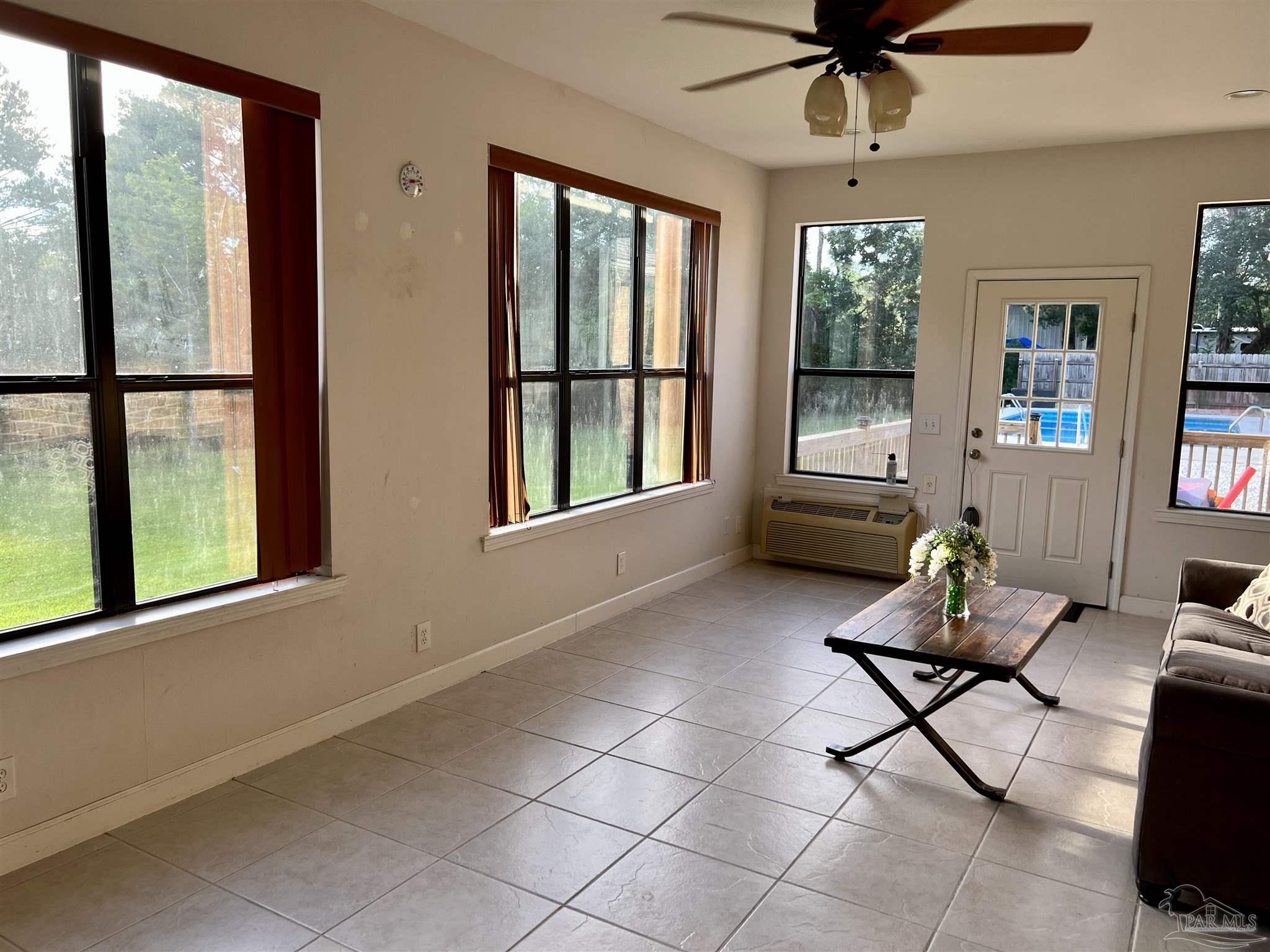 1913 Filly Road Cantonment, FL 32533 - Photo 17 of 50 Sun Room