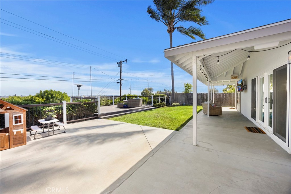 15914 West Road Whittier, CA 90603 - Photo 40 of 47 a view of a backyard with couches under an umbrella