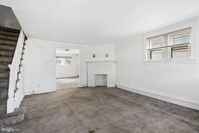 an empty room with windows