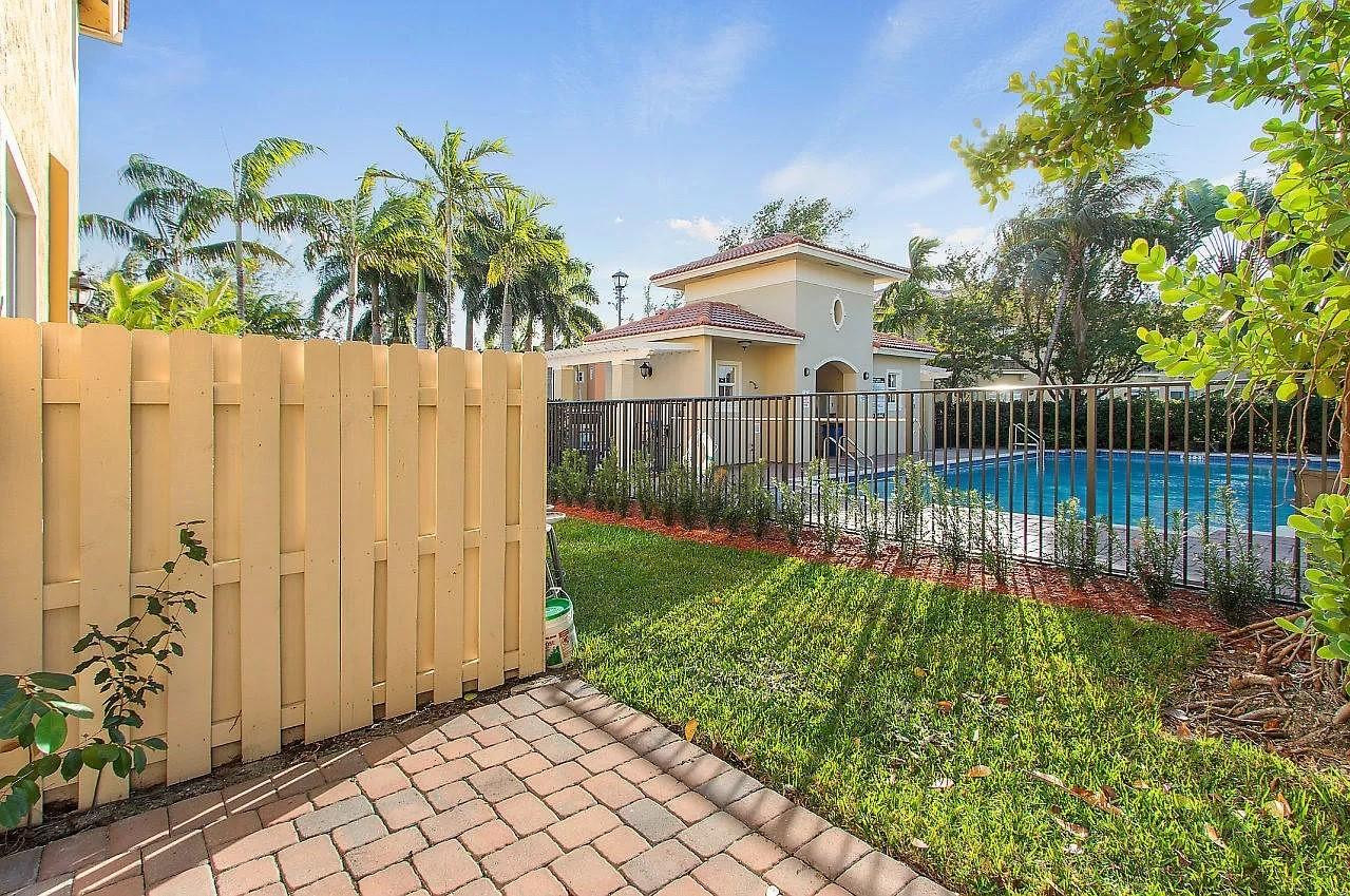 2851 Prospect Road Tamarac, FL 33309 - Photo 18 of 21 a view of a garden with a small yard