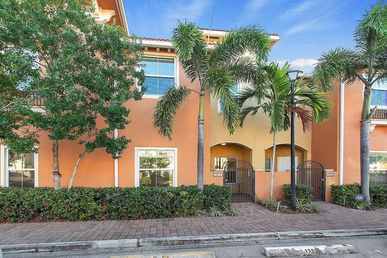 2851 Prospect Road Tamarac, FL 33309 - Photo 21 of 21 a front view of house with yard and green space