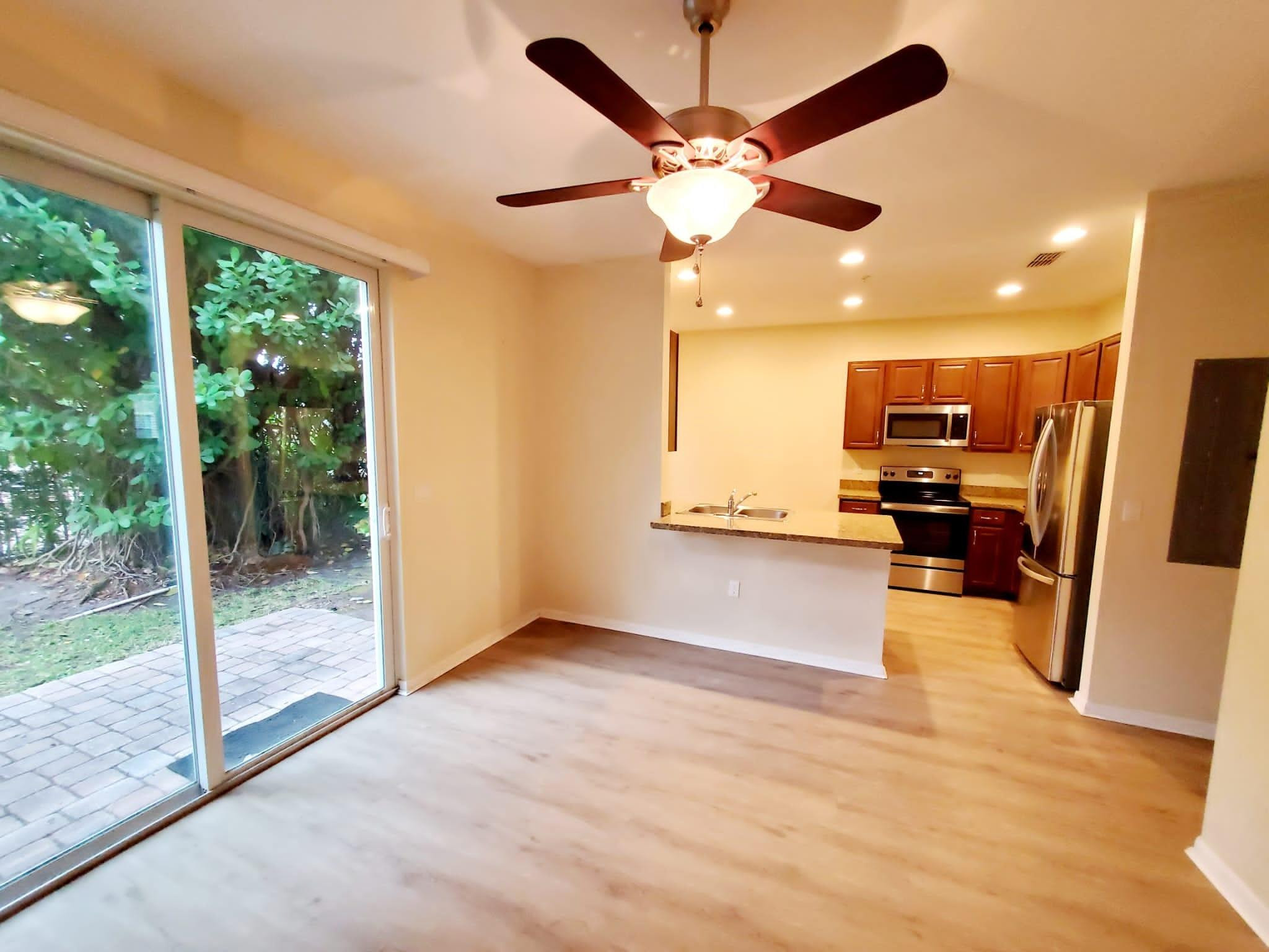 2851 Prospect Road Tamarac, FL 33309 - Photo 5 of 21 a view of a kitchen with a stove