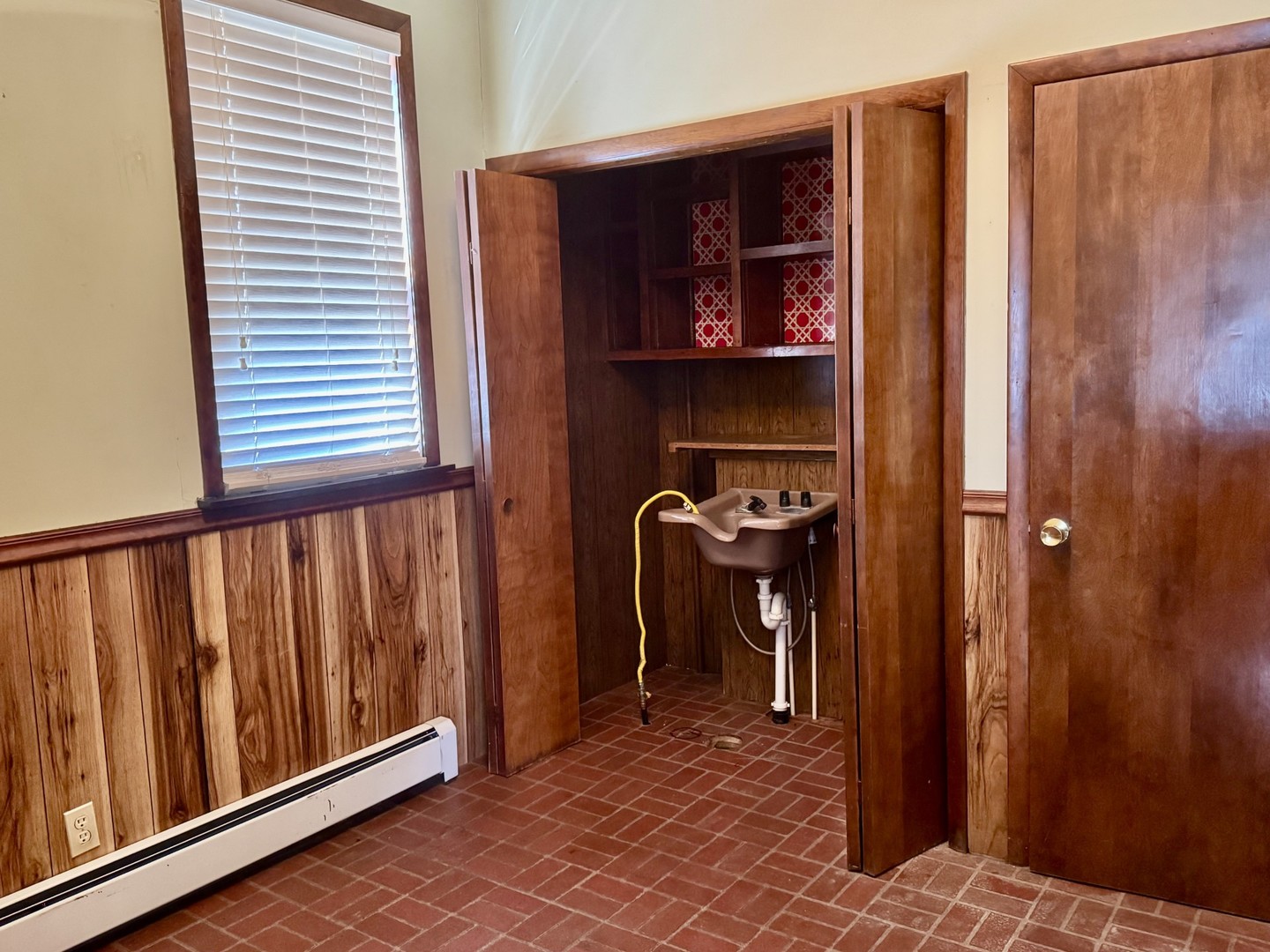 3 Trexler Avenue Oglesby, IL 61348 - Photo 13 of 20 a view of a hallway with wooden floor and a window
