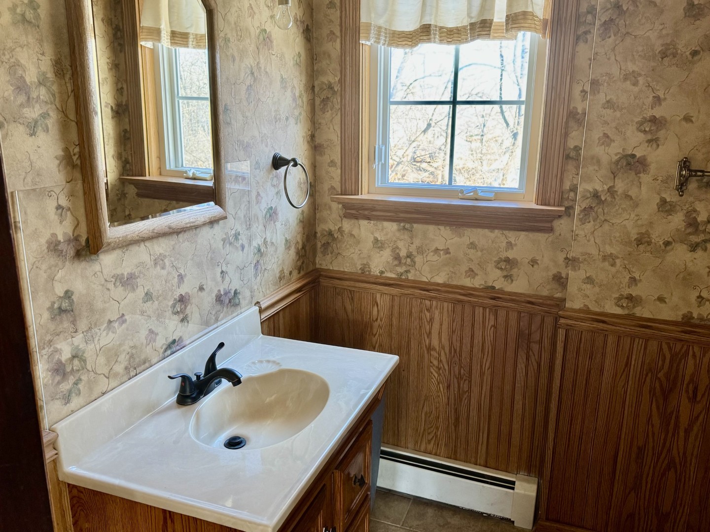 3 Trexler Avenue Oglesby, IL 61348 - Photo 14 of 20 a bathroom with a sink and a window