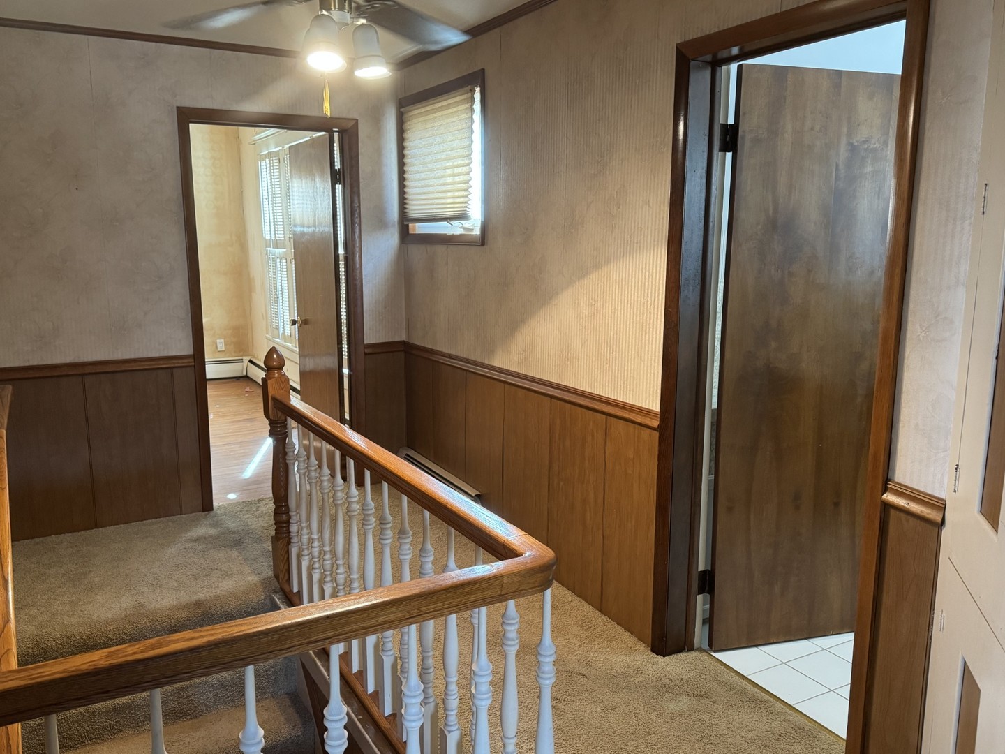 3 Trexler Avenue Oglesby, IL 61348 - Photo 16 of 20 a view of staircase with railing and white walls