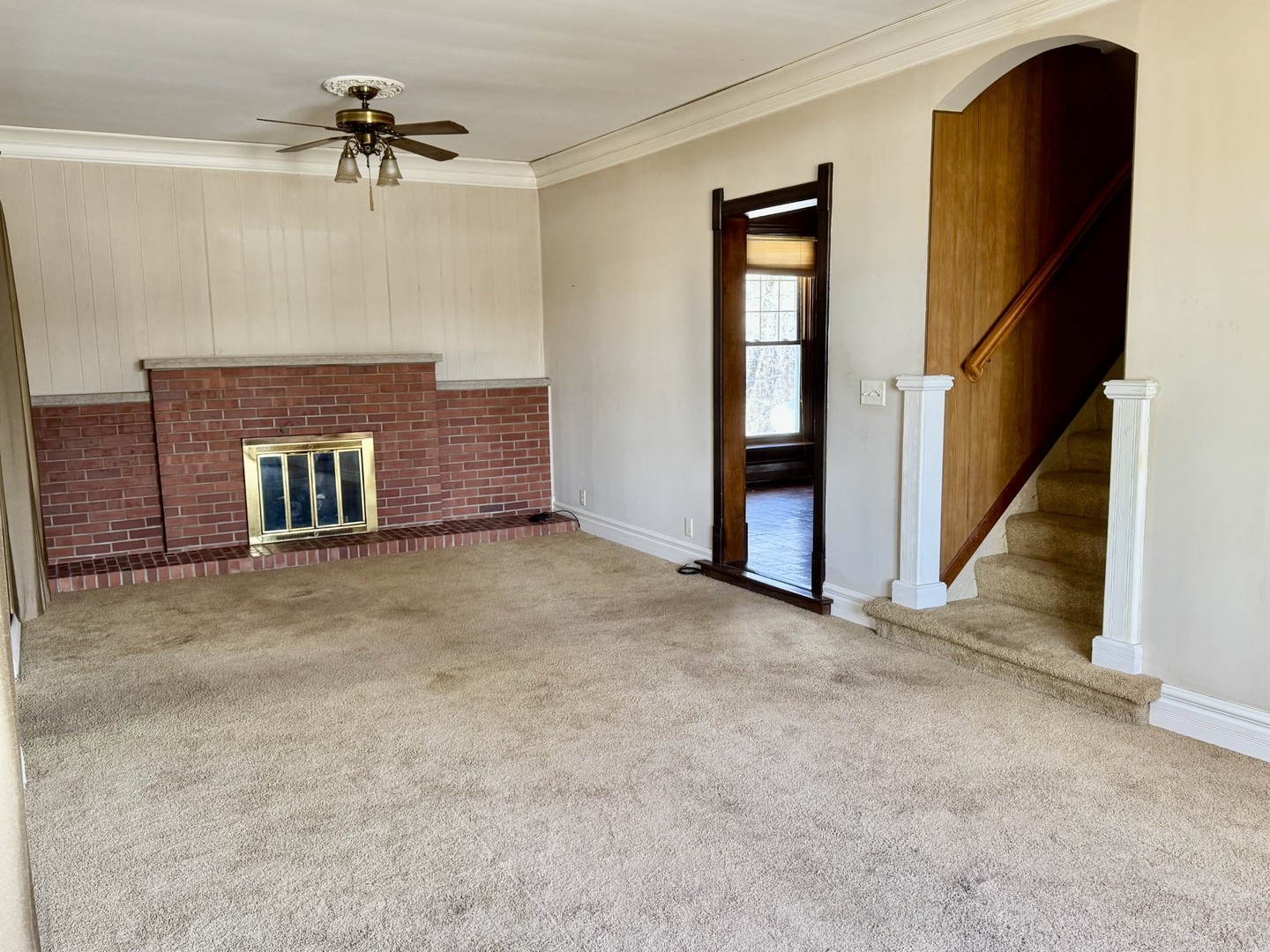 3 Trexler Avenue Oglesby, IL 61348 - Photo 7 of 20 an empty room with windows cabinet and fireplace