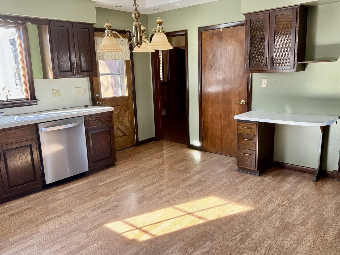 3 Trexler Avenue Oglesby, IL 61348 - Photo 10 of 20 a kitchen with stainless steel appliances granite countertop a refrigerator and a sink