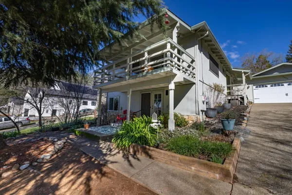 a view of a house with a patio