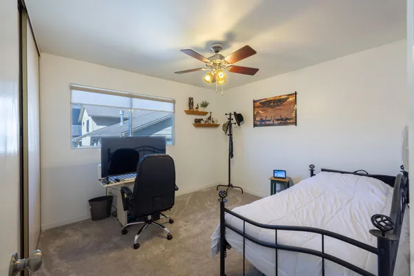 a view of a workspace with furniture