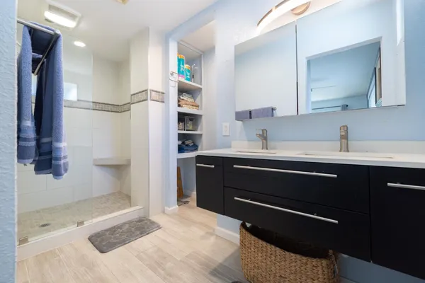 a bathroom with a sink and a mirror