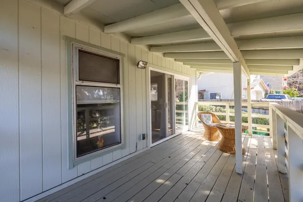 a view of a living room and dining room