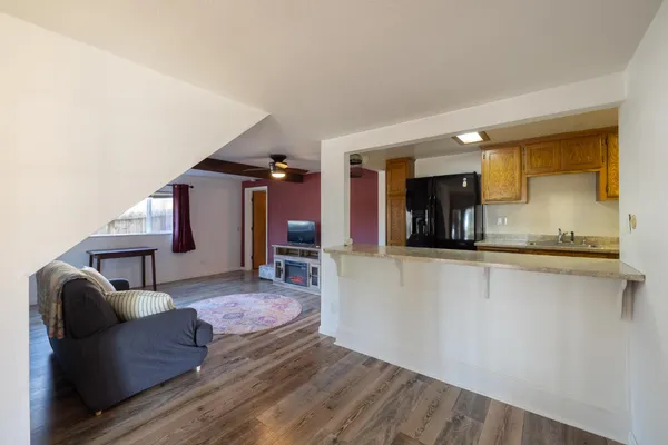 a view of livingroom with furniture and wooden floor