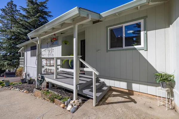a house with trees in front of it