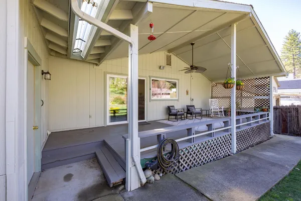 a view of a swimming pool with a backyard