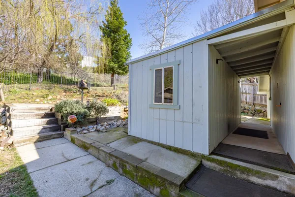 a backyard of a house with lots of green space