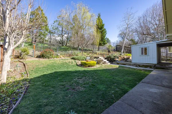 a view of a pathway with a park
