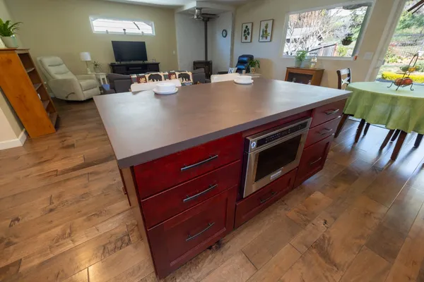 a view of kitchen and dining area with furniture