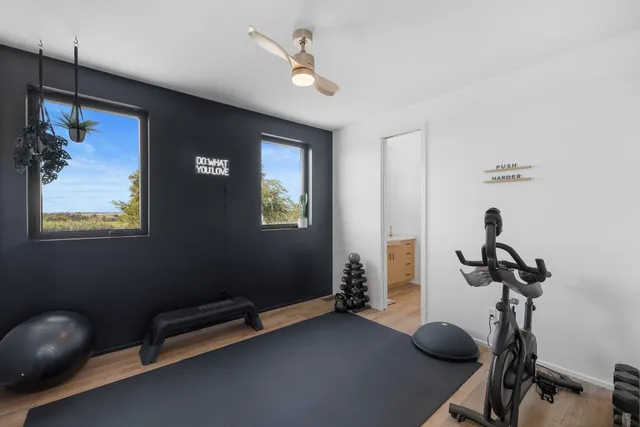 a view of a room with gym equipment
