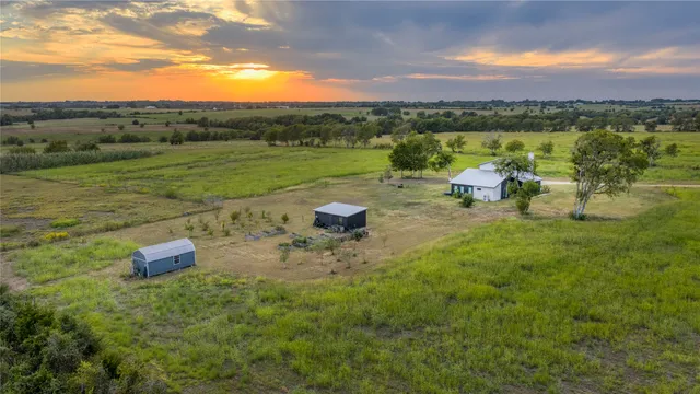 a garden view with a lake view