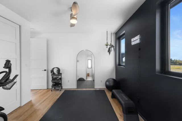a view of living room with furniture and a window