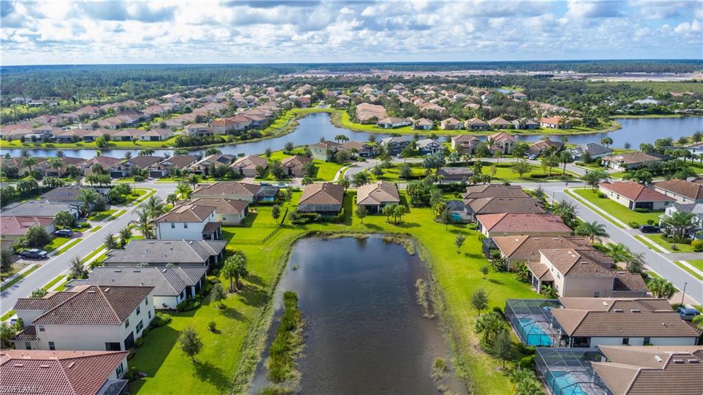 2075 Parson Street Naples, FL 34120 - Photo 14 of 15 an aerial view of residential houses with outdoor space