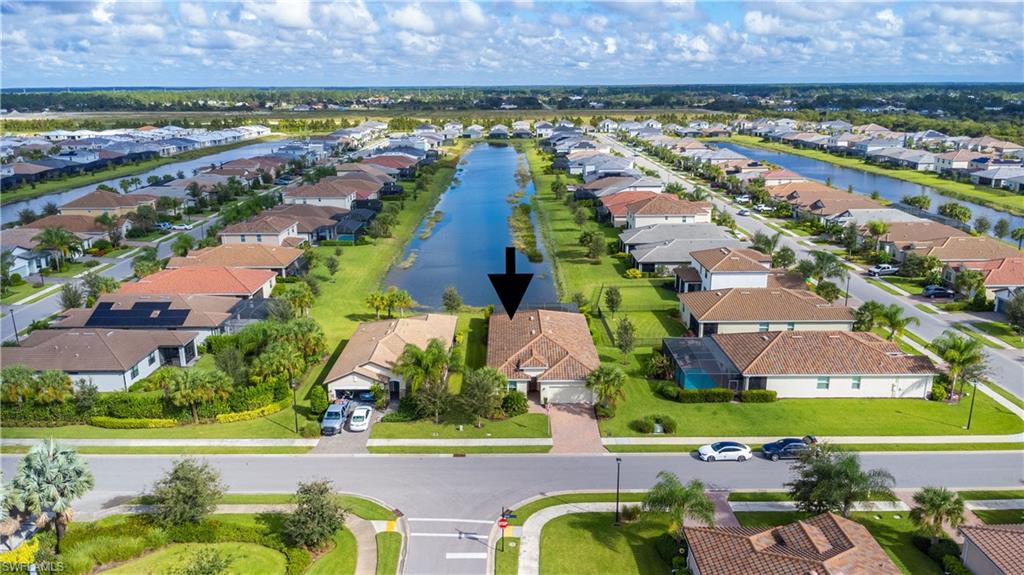 2075 Parson Street Naples, FL 34120 - Photo 15 of 15 an aerial view of residential houses with outdoor space and swimming pool