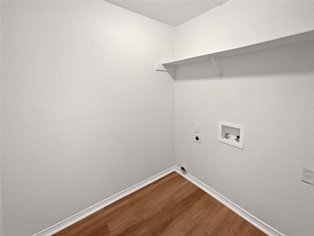 4346 Hamilton Avenue Dallas, TX 75210 - Photo 13 of 16 a view of a small space with wooden floor