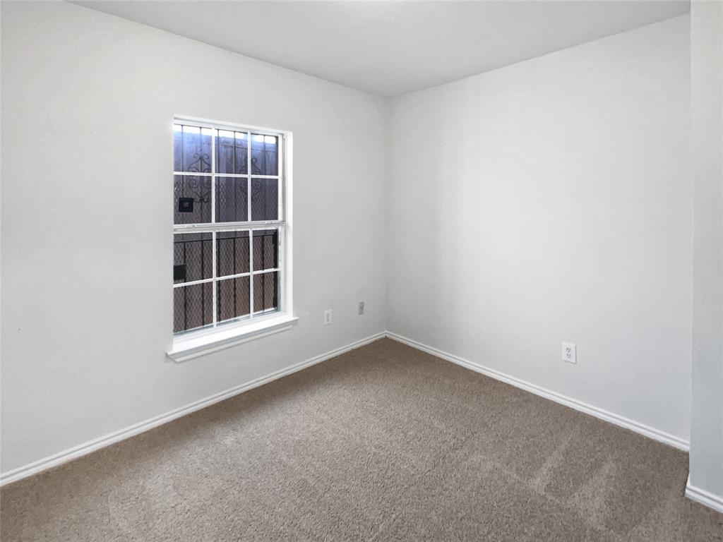 4346 Hamilton Avenue Dallas, TX 75210 - Photo 8 of 16 a view of empty room with windows