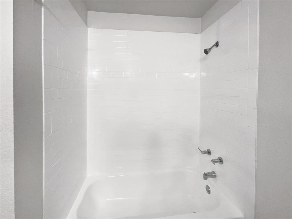 4346 Hamilton Avenue Dallas, TX 75210 - Photo 10 of 16 a close up of a bathtub