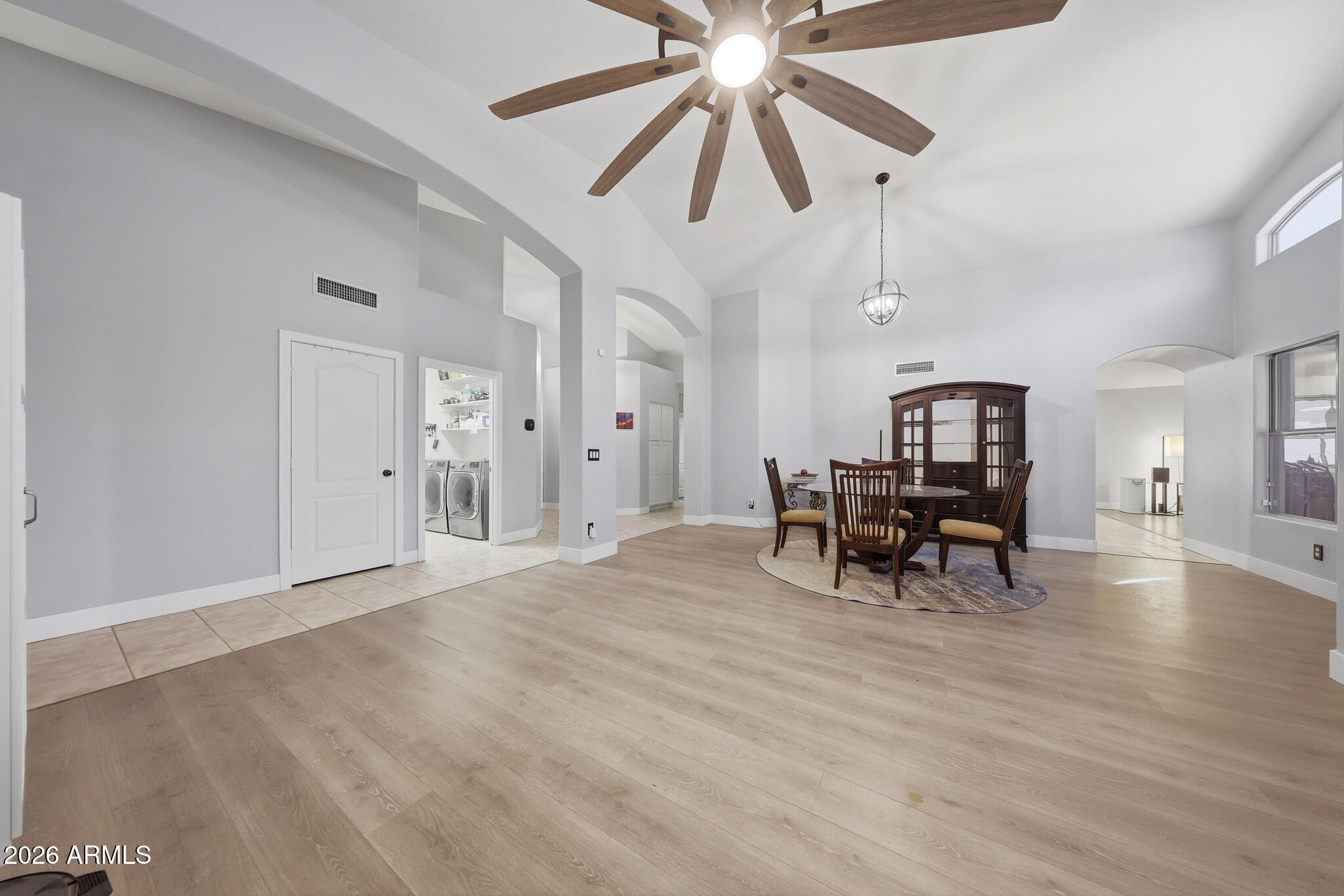 2153 East Kempton Road Chandler, AZ 85225 - Photo 5 of 50 a view of a livingroom with furniture and a ceiling fan