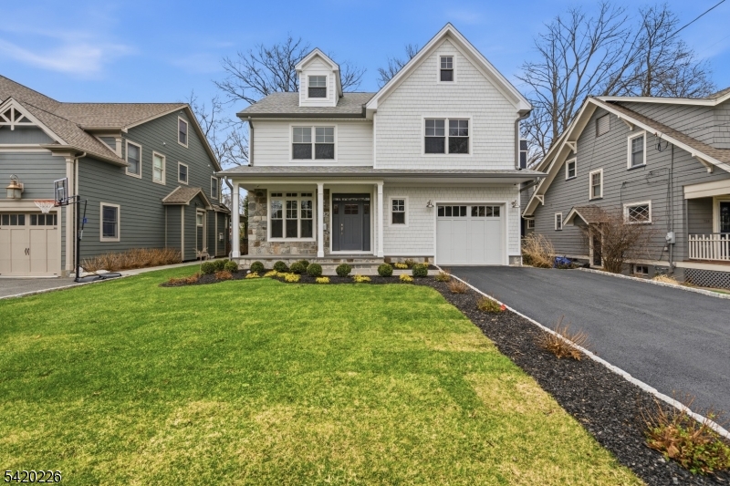 732 Embree Crescent Westfield, NJ 07090 - Photo 1 of 47 a front view of house with yard and green space