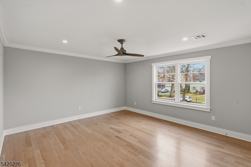 732 Embree Crescent Westfield, NJ 07090 - Photo 16 of 47 a view of an empty room with a window