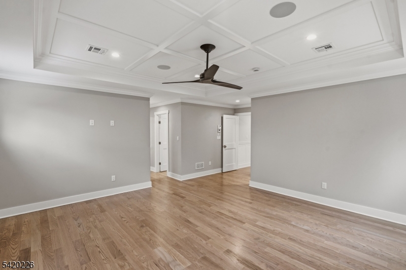 732 Embree Crescent Westfield, NJ 07090 - Photo 24 of 47 wooden floor in an empty room with a window