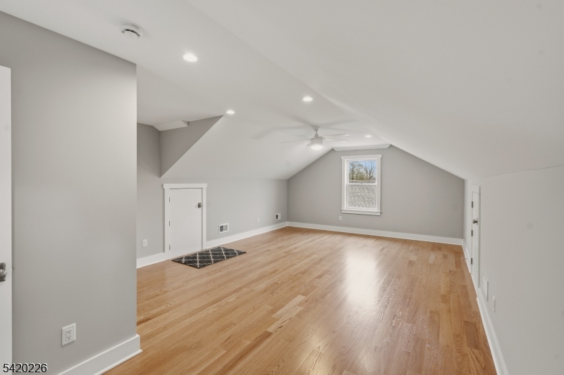 732 Embree Crescent Westfield, NJ 07090 - Photo 31 of 47 an empty room with wooden floor and windows