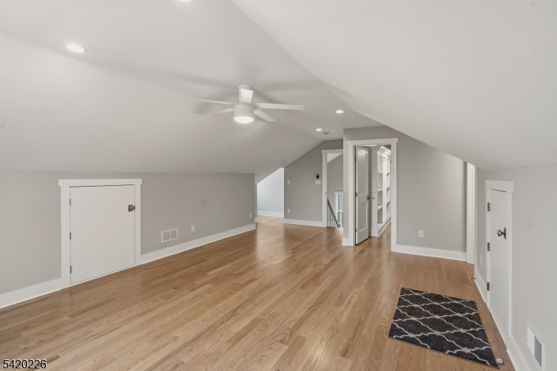 732 Embree Crescent Westfield, NJ 07090 - Photo 32 of 47 wooden floor in an empty room with a window