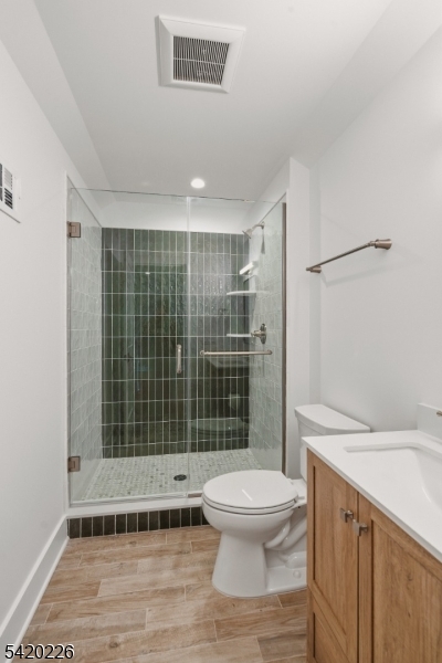732 Embree Crescent Westfield, NJ 07090 - Photo 33 of 47 a bathroom with a sink toilet and shower