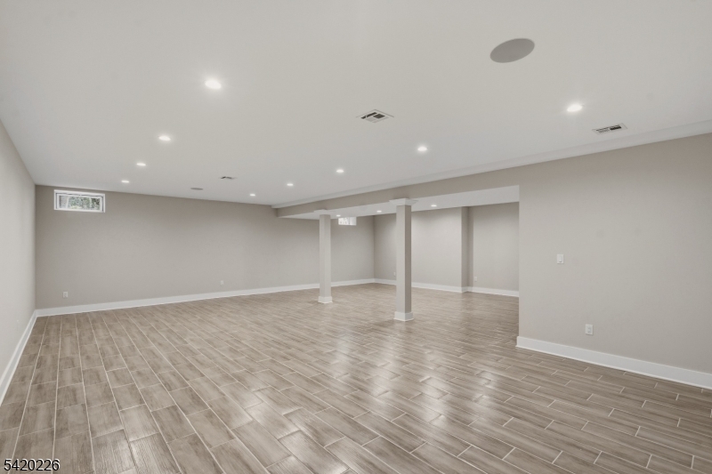 732 Embree Crescent Westfield, NJ 07090 - Photo 36 of 47 a view of an empty room with wooden floor