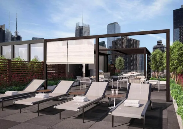 a view of backyard with outdoor seating