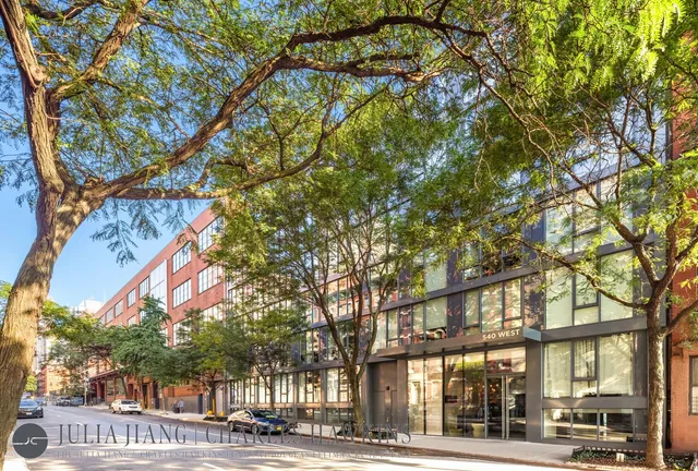a view of a city street from a building