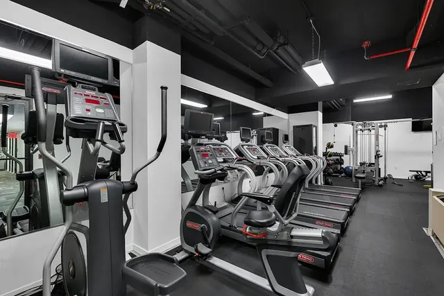 a view of a room with gym equipment