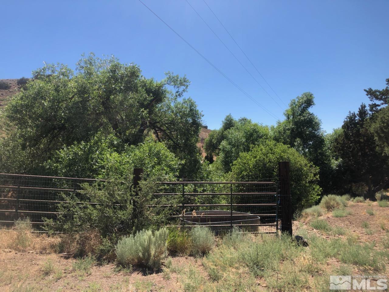 1955 Piute Creek Road Reno, NV 89510 - Photo 2 of 18 a view of house with outdoor space and swimming pool