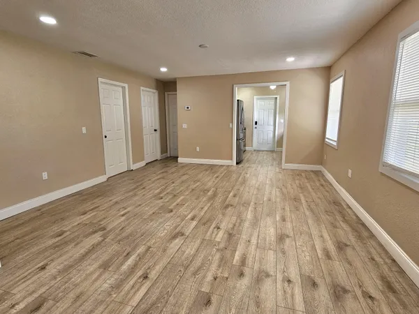 a view of an empty room and window