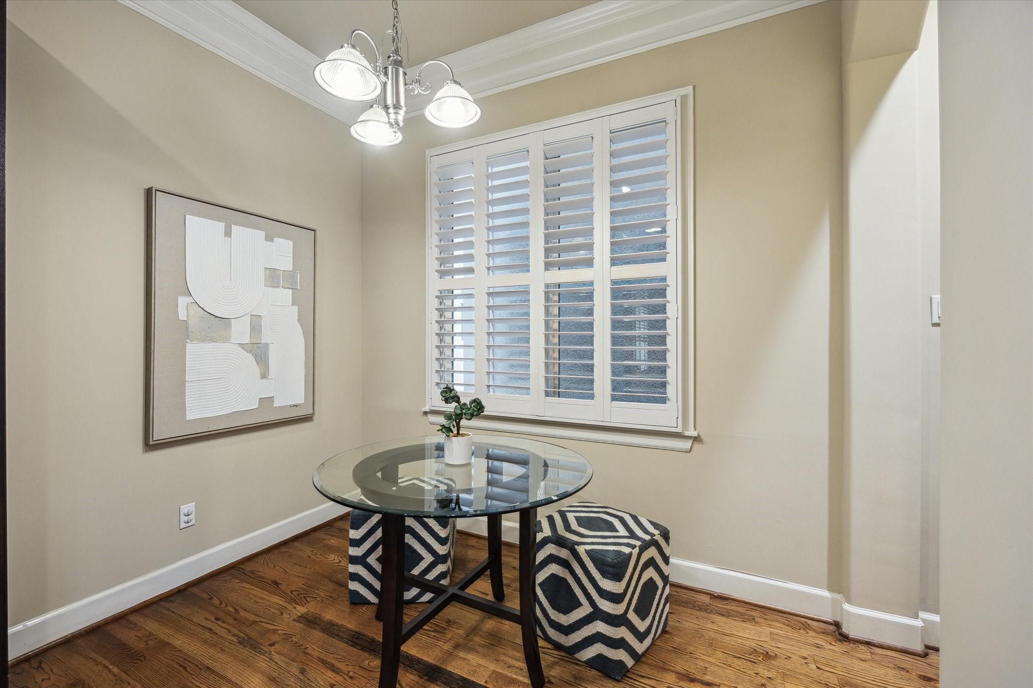 2006 Helena Street Houston, TX 77002 - Photo 14 of 38 a view of a dining room with furniture window and wooden floor
